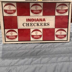 IU checkers game still in plastic. Fair condition.